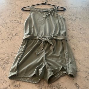 Green romper from Walmart. Perfect condition almost never worn. Very soft.